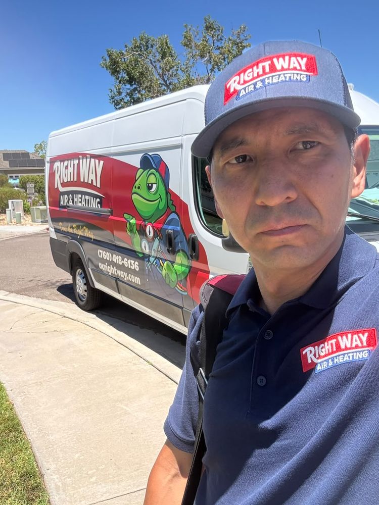 Right Way Air & Heating senior technician with branded service van in San Diego